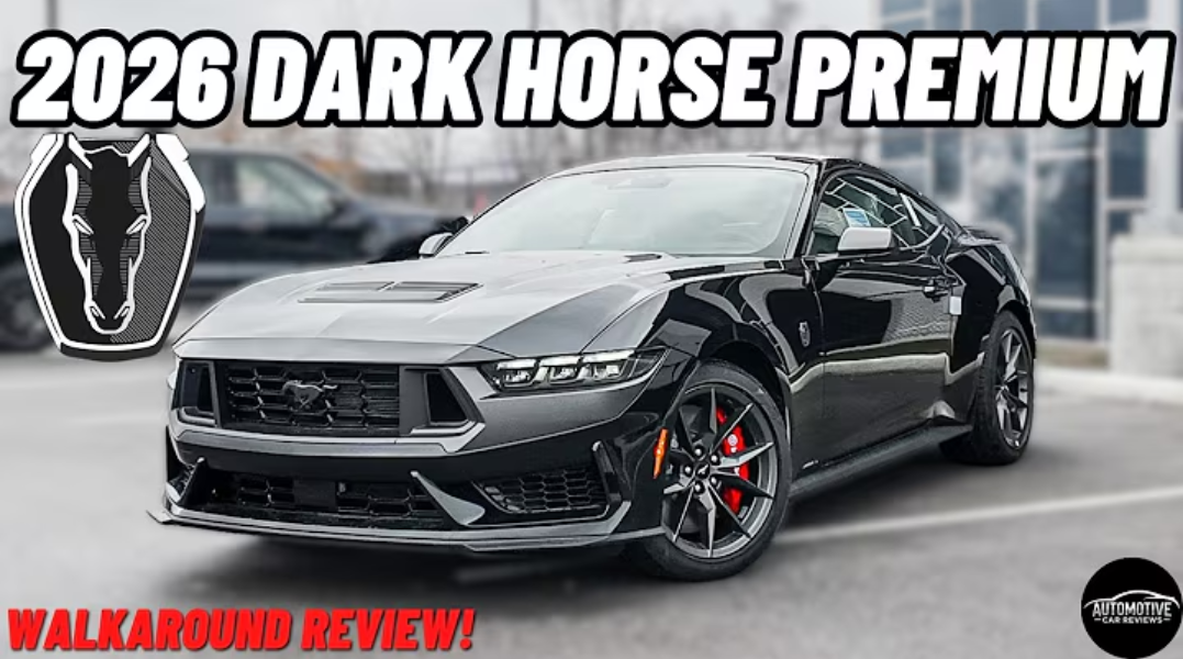 Side view of a black Ford Mustang with sleek design and alloy wheels