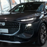 Front view of 2026 Audi Q3 top model showing large Singleframe grille, sharp LED headlights, and sporty bumper design