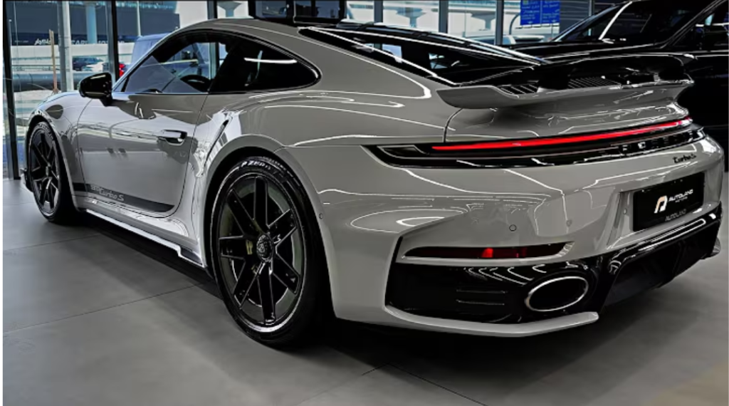 2026 Porsche 911 Turbo S exterior design in silver with active rear spoiler